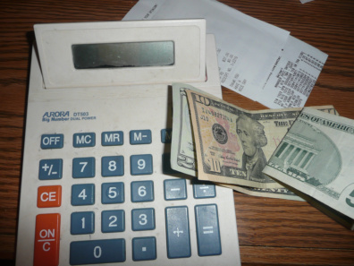 Calculator, receipt, cash pic